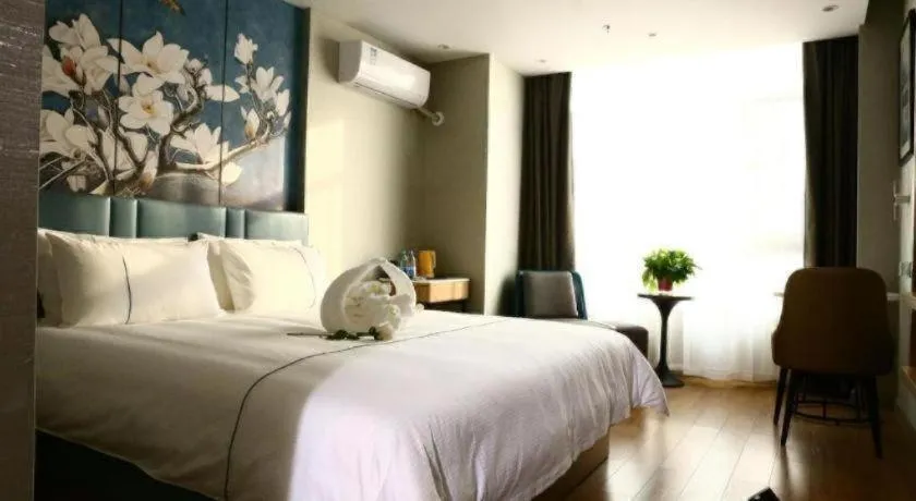 Bed in Magnotel Hengshui Lake Jizhou Middle School