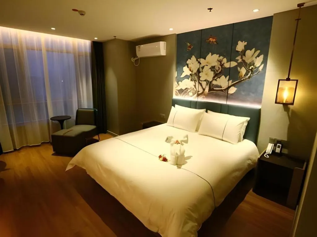 Bed in Magnotel Hengshui Lake Jizhou Middle School