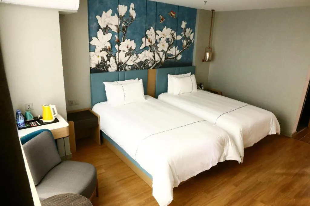 Bed in Magnotel Hengshui Lake Jizhou Middle School