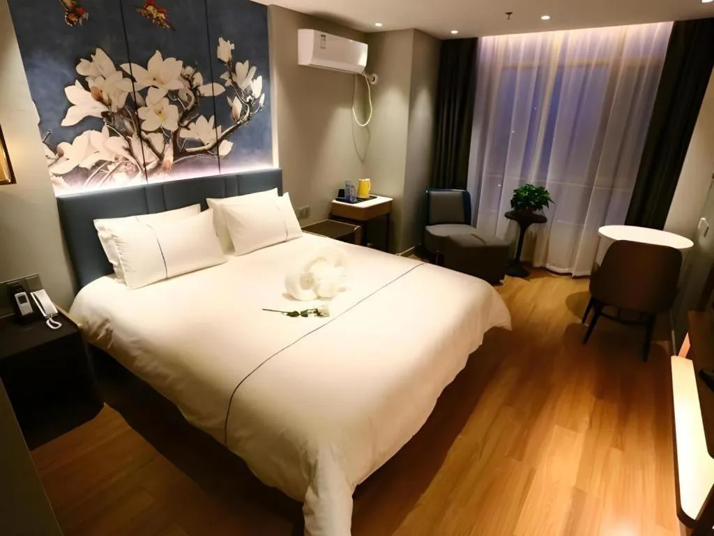 Bed in Magnotel Hengshui Lake Jizhou Middle School