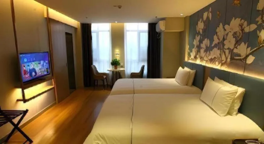 Bed in Magnotel Hengshui Lake Jizhou Middle School