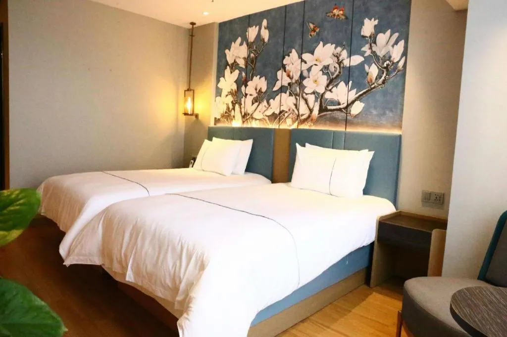 Bed in Magnotel Hengshui Lake Jizhou Middle School