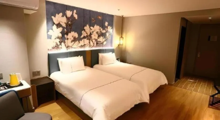 Bed in Magnotel Hengshui Lake Jizhou Middle School