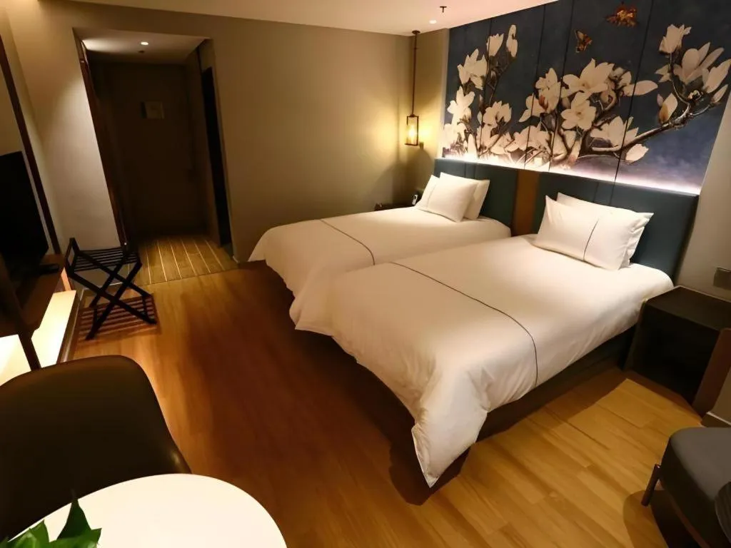 Bed in Magnotel Hengshui Lake Jizhou Middle School