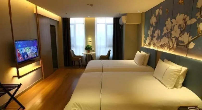 Bed in Magnotel Hengshui Lake Jizhou Middle School