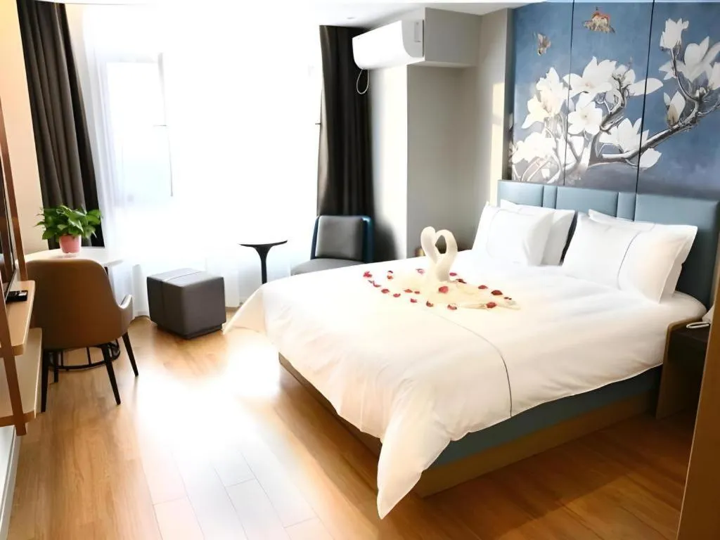 Bed in Magnotel Hengshui Lake Jizhou Middle School