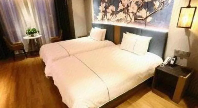 Bed in Magnotel Hengshui Lake Jizhou Middle School