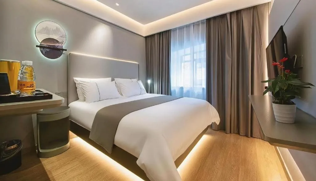 Bed in Magnotel Hotel Wuhan Jiangtan Lihuangpo Road Pedestrian Street