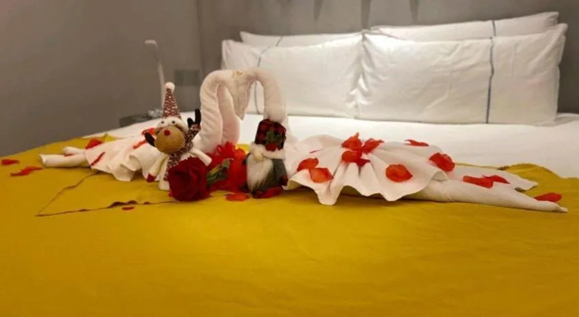 Bed in Magnotel Hotel Wuhan Jiangtan Lihuangpo Road Pedestrian Street