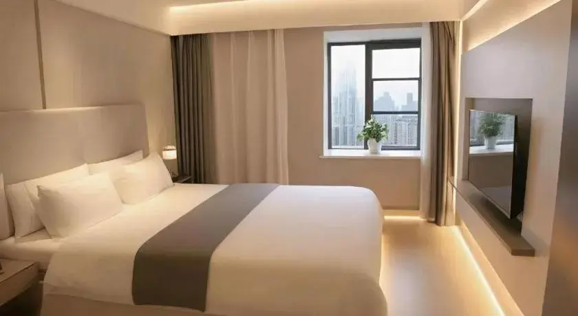 Bed in Magnotel Hotel Wuhan Jiangtan Lihuangpo Road Pedestrian Street Bed in Magnotel Hotel Wuhan Jiangtan Lihuangpo Road Pedestrian Street