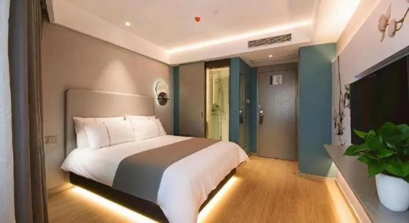 Bed in Magnotel Hotel Wuhan Jiangtan Lihuangpo Road Pedestrian Street
