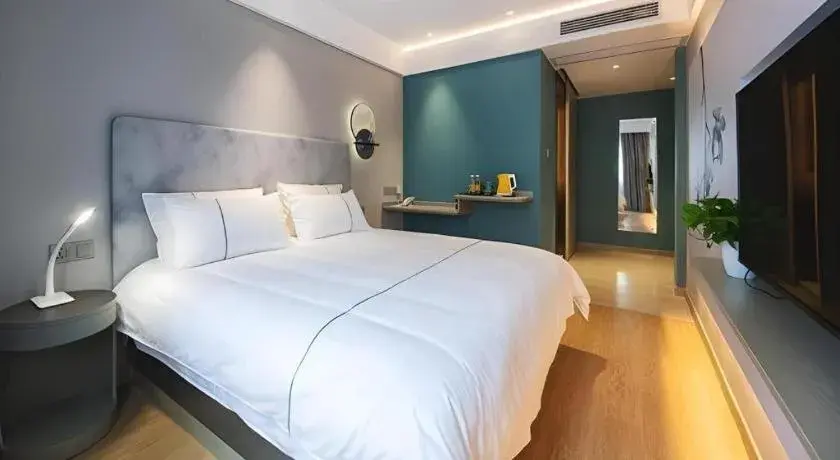 Bed in Magnotel Hotel Wuhan Jiangtan Lihuangpo Road Pedestrian Street Bed in Magnotel Hotel Wuhan Jiangtan Lihuangpo Road Pedestrian Street