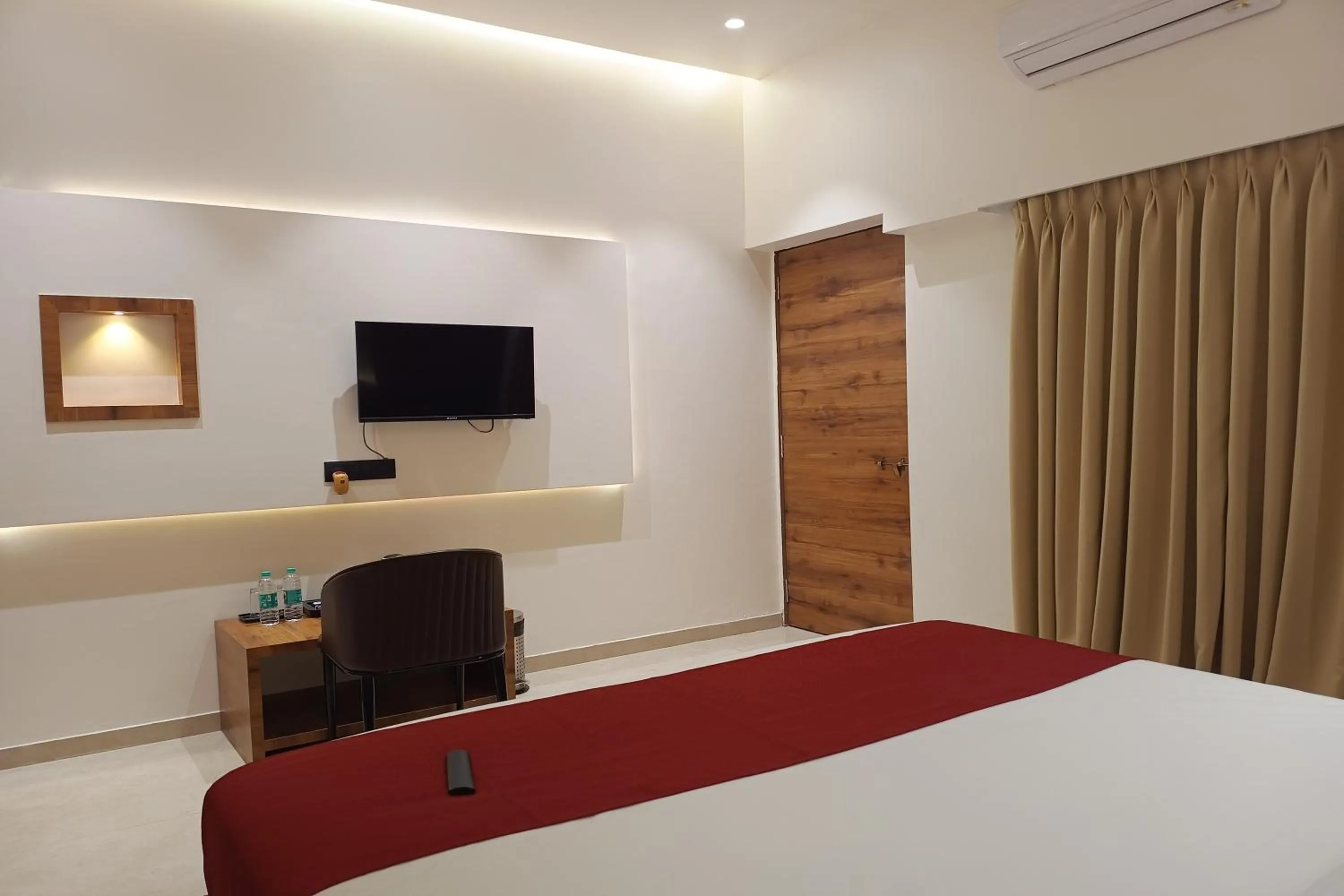 Bedroom, Bed in Madhav Residency Hotel & Banquet, Kalyan, Mumbai