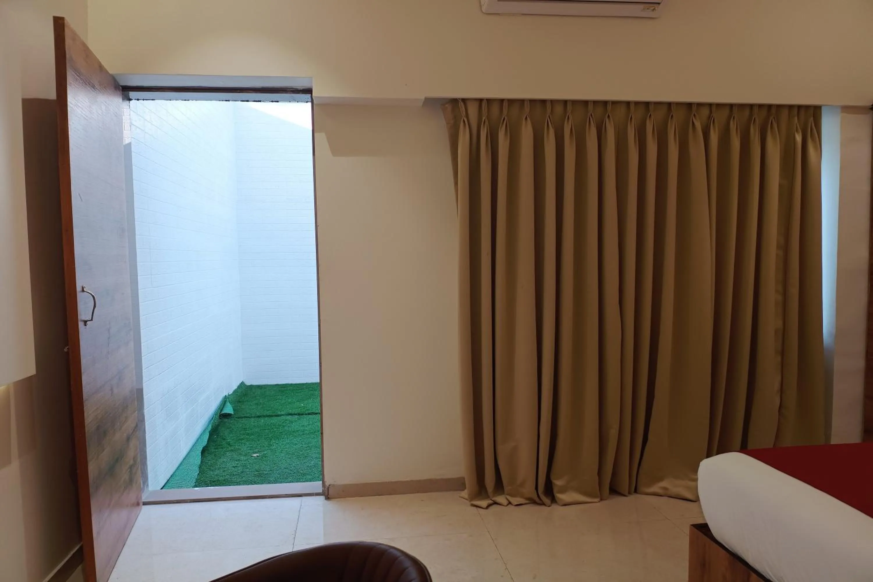 Bedroom, Bed in Madhav Residency Hotel & Banquet, Kalyan, Mumbai