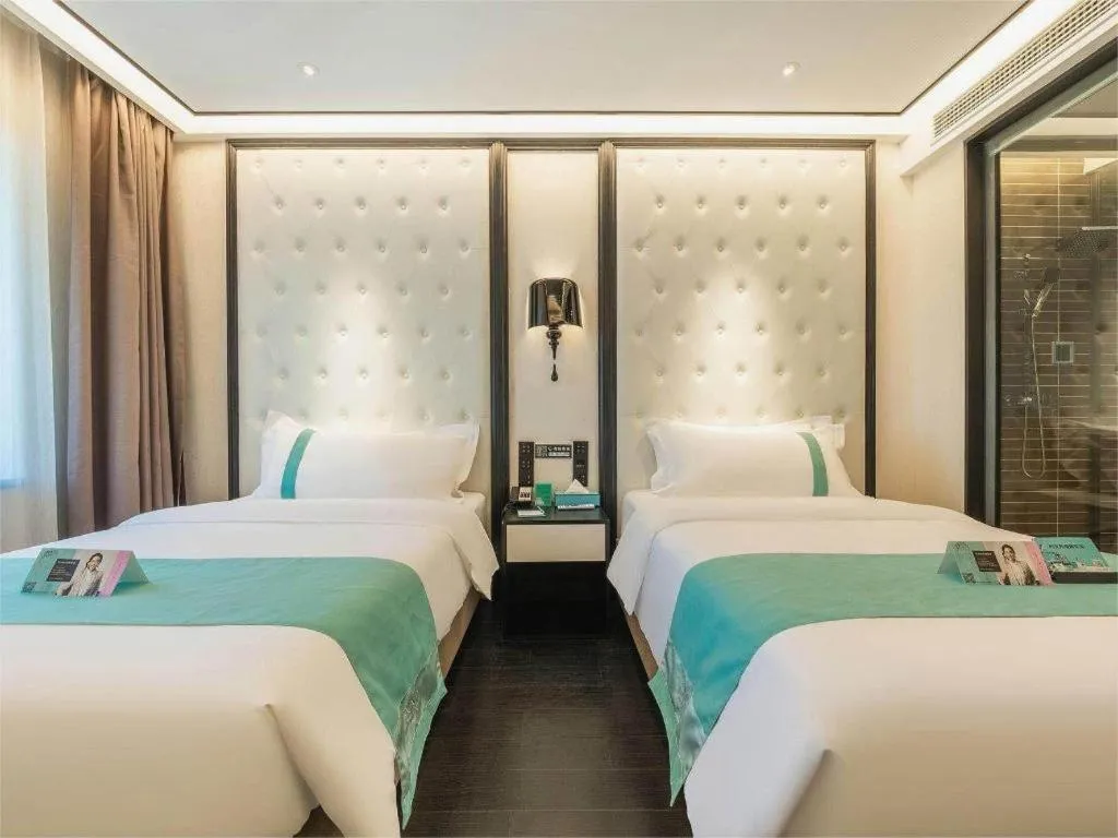 Bed in Xana Hotelle Nanchang Hongdu Middle Avenue Provincial TV Station