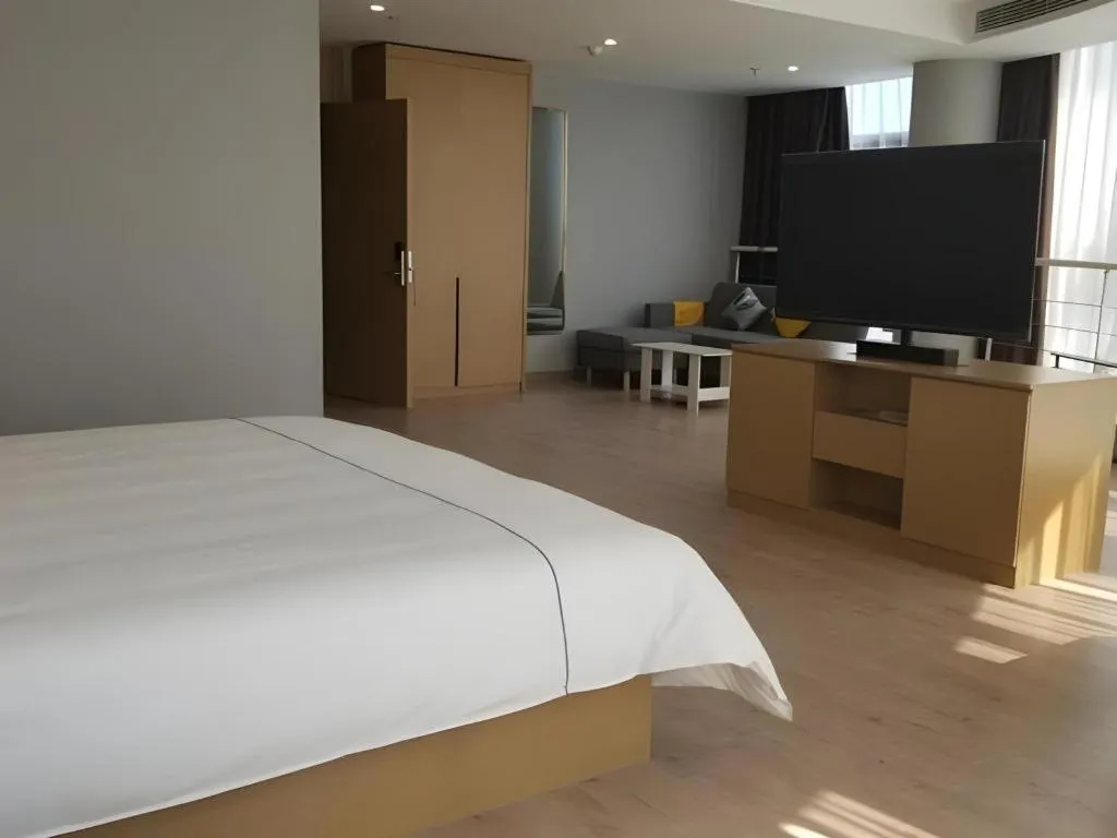 Bed in Magnotel Nanjing Lishui Baota Bei Road