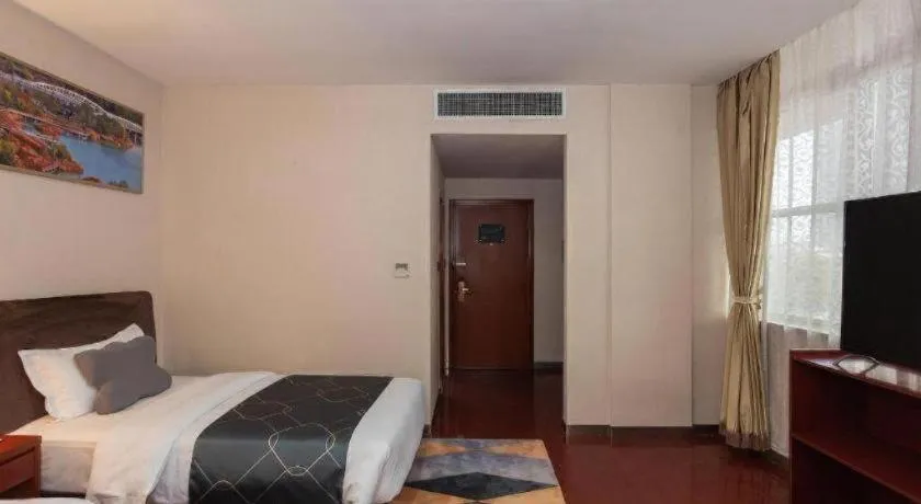 Bed in Chonpines Hotel Jining Quanmin Fitness Plaza