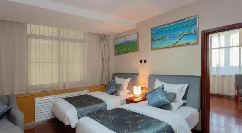 Bed in Chonpines Hotel Jining Quanmin Fitness Plaza