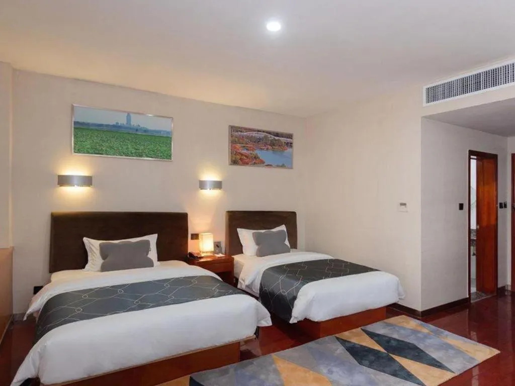 Bed in Chonpines Hotel Jining Quanmin Fitness Plaza