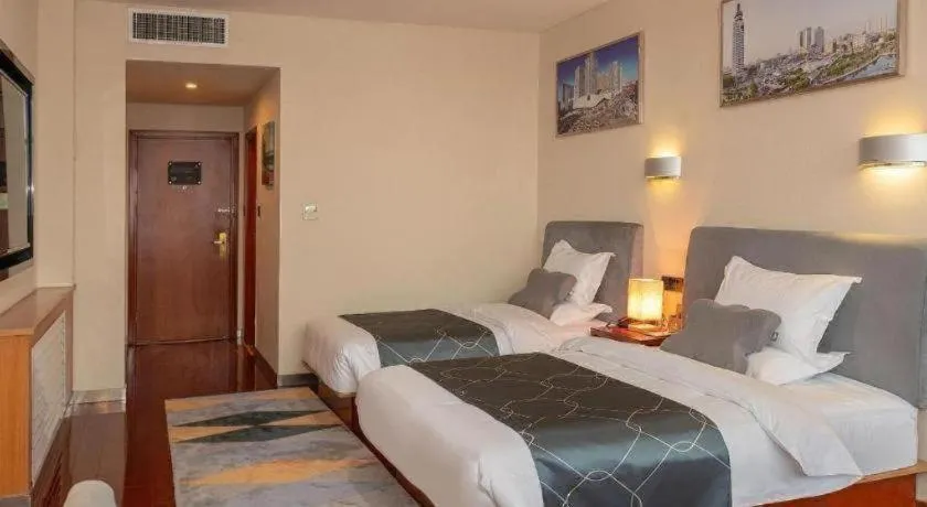 Bed in Chonpines Hotel Jining Quanmin Fitness Plaza