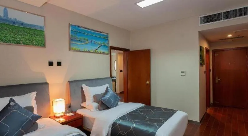 Bed in Chonpines Hotel Jining Quanmin Fitness Plaza