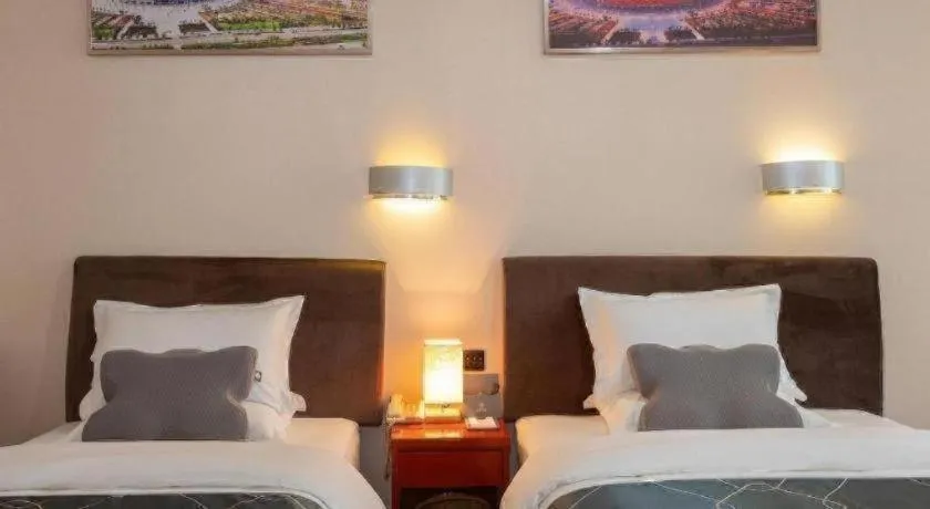 Bed in Chonpines Hotel Jining Quanmin Fitness Plaza