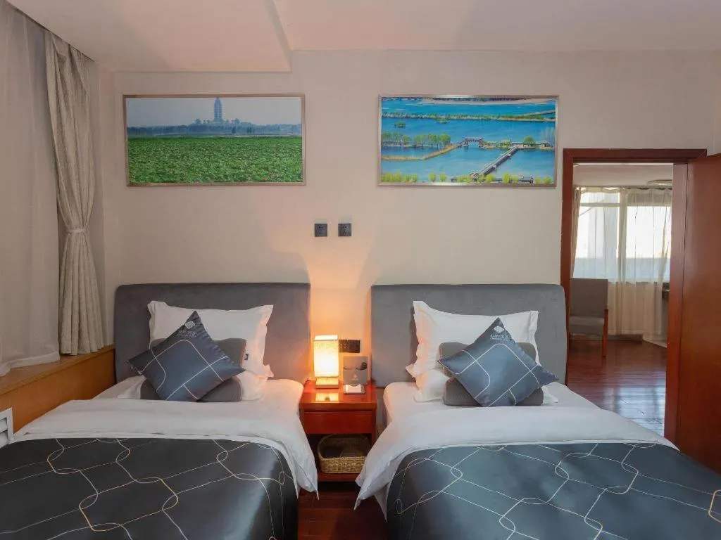 Bed in Chonpines Hotel Jining Quanmin Fitness Plaza