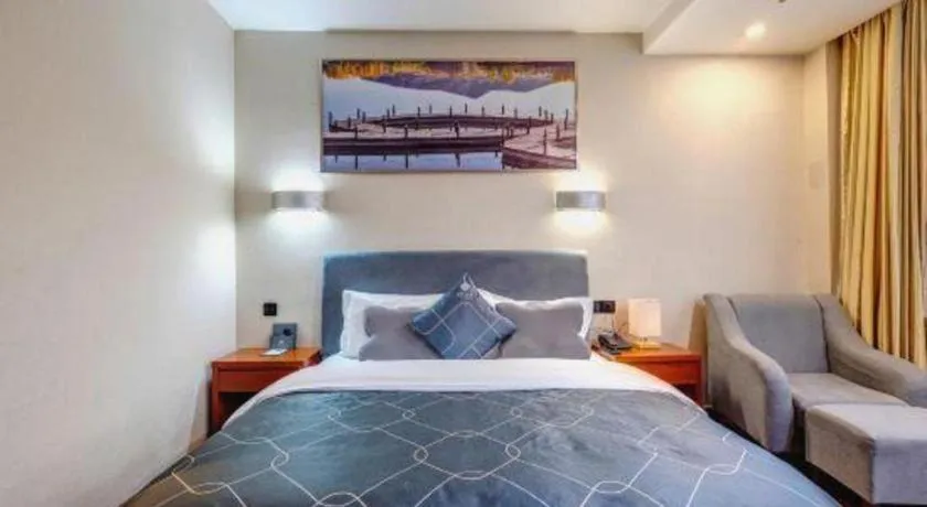 Bed in Chonpines Hotel Jining Quanmin Fitness Plaza