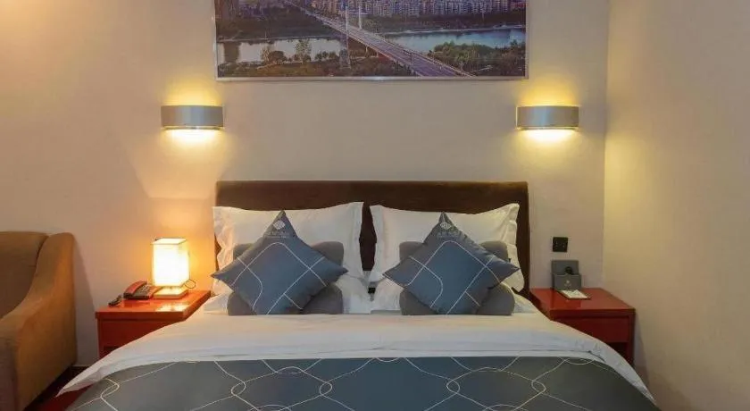 Bed in Chonpines Hotel Jining Quanmin Fitness Plaza