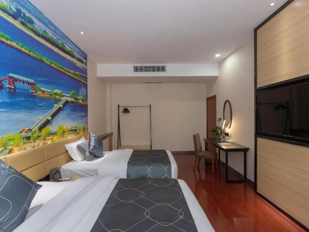 Bed in Chonpines Hotel Jining Quanmin Fitness Plaza