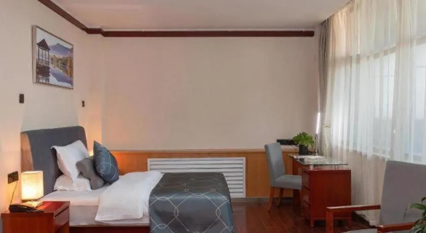 Bed in Chonpines Hotel Jining Quanmin Fitness Plaza