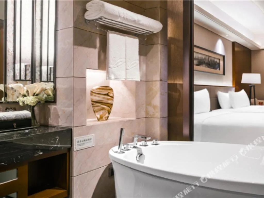 Bed in Country Garden Phoenix Hotel Yiyang