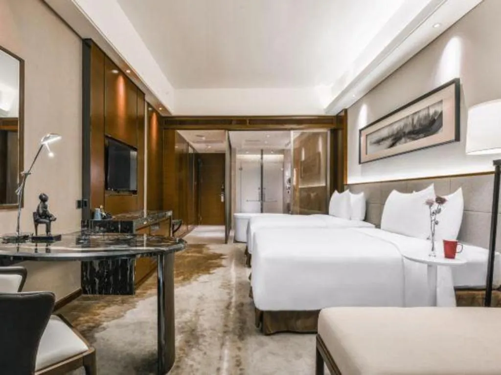 Bed in Country Garden Phoenix Hotel Yiyang