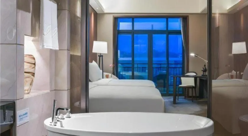 Bed in Country Garden Phoenix Hotel Yiyang