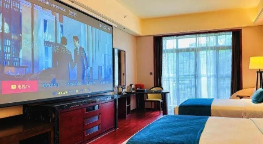 Bed in Country Garden Phoenix Hotel Yiyang