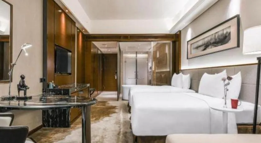 Bed in Country Garden Phoenix Hotel Yiyang