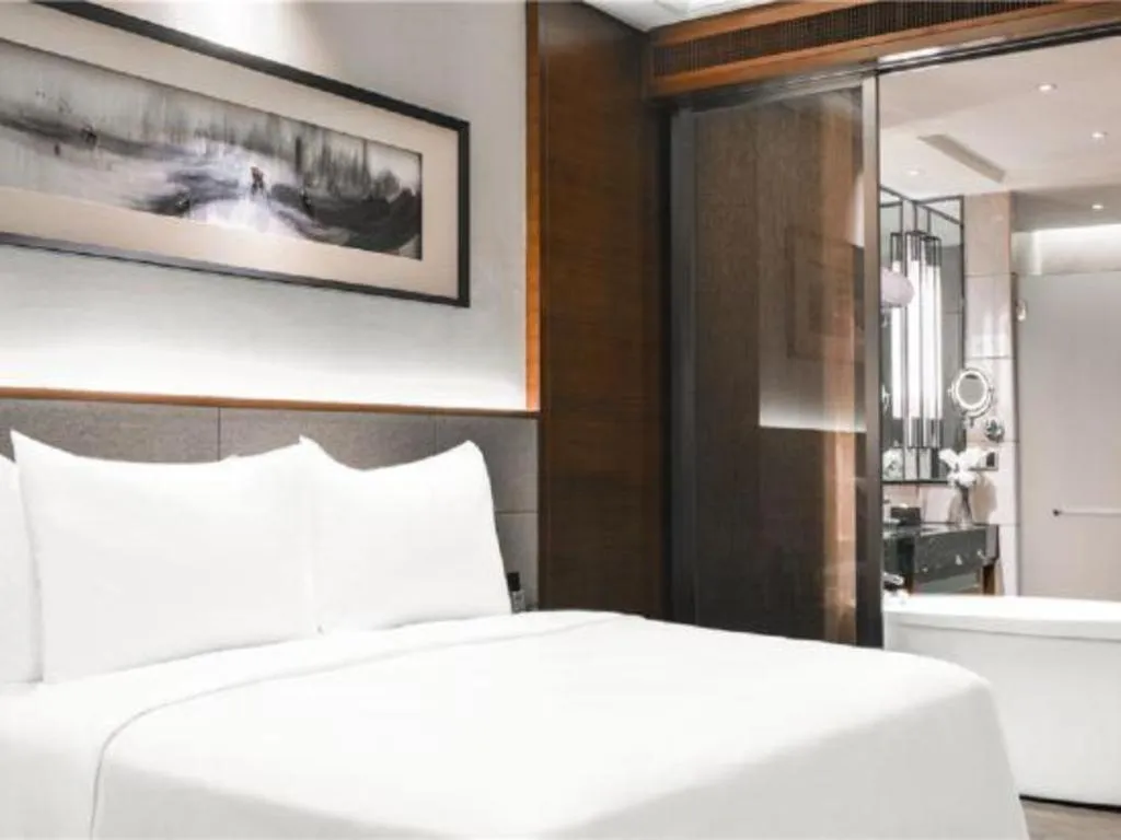 Bed in Country Garden Phoenix Hotel Yiyang