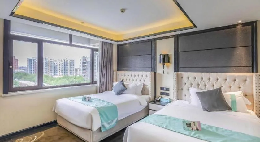 Bed in Xana Hotelle Tangshan North Railway Station