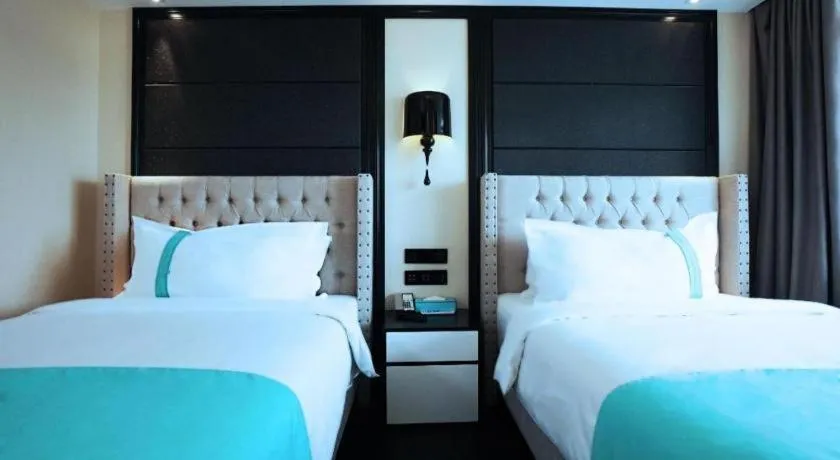 Bed in Xana Hotelle Tangshan North Railway Station