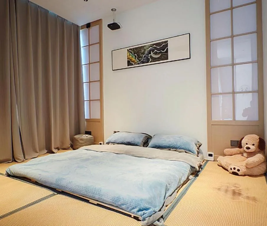 Bed in Ramada by Wyndham Guergou