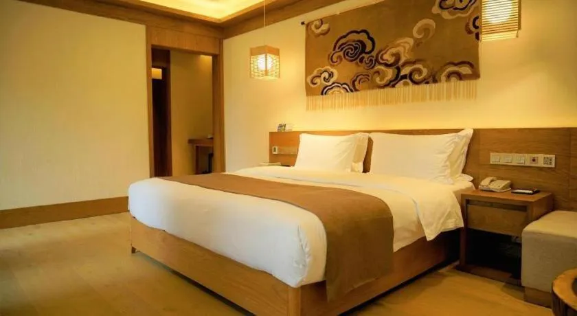 Bed in Ramada by Wyndham Guergou