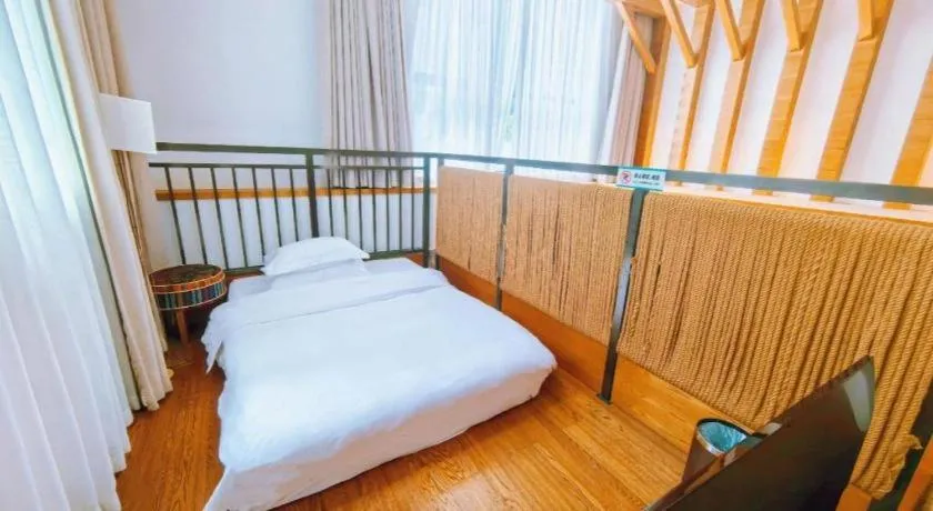 Bed in Ramada by Wyndham Guergou