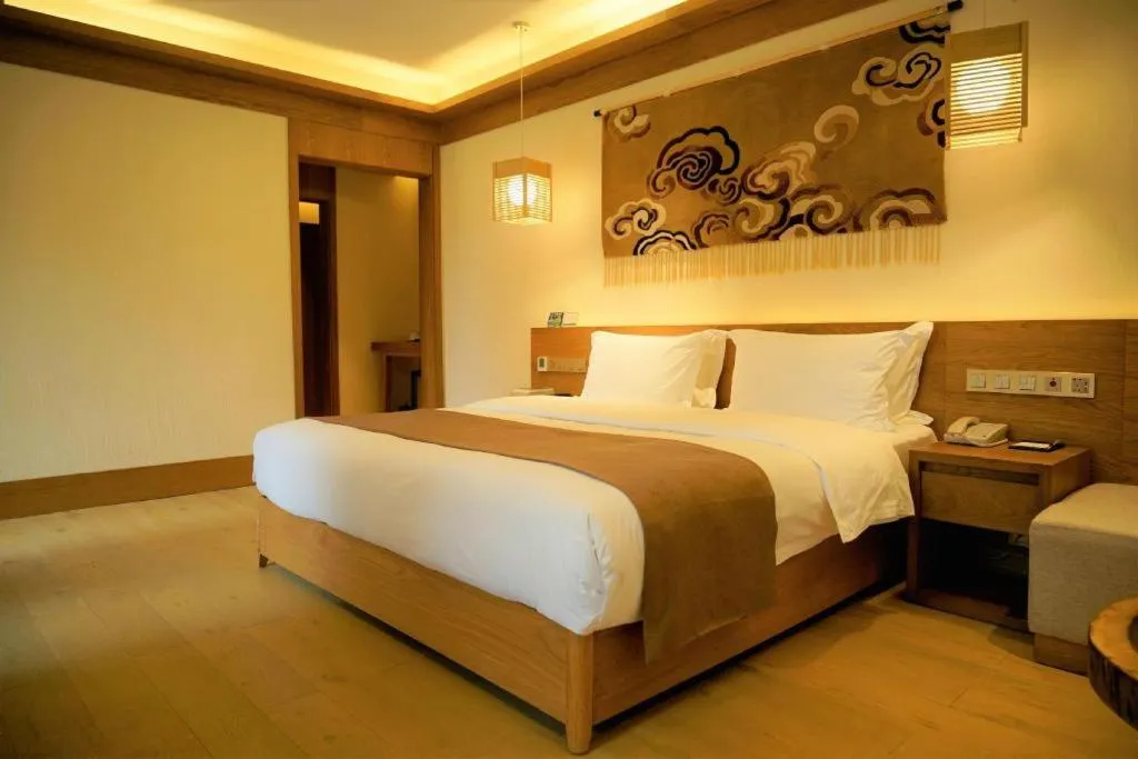 Bed in Ramada by Wyndham Guergou