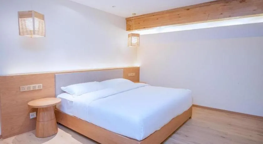 Bed in Ramada by Wyndham Guergou