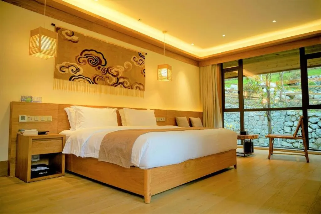 Bed in Ramada by Wyndham Guergou