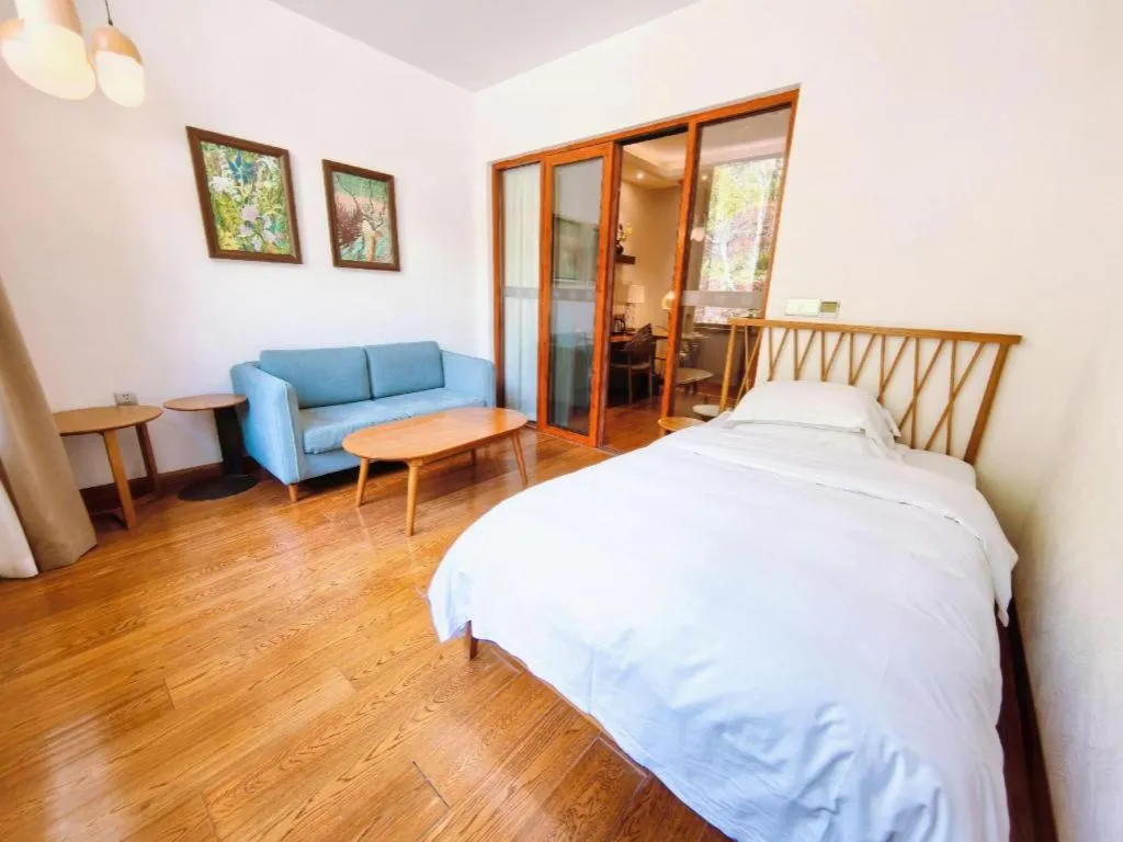 Bed in Ramada by Wyndham Guergou