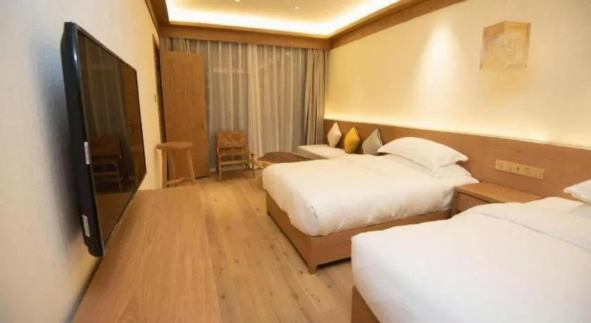 Bed in Ramada by Wyndham Guergou