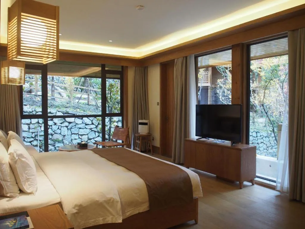 Bed in Ramada by Wyndham Guergou