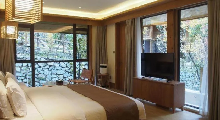 Bed in Ramada by Wyndham Guergou