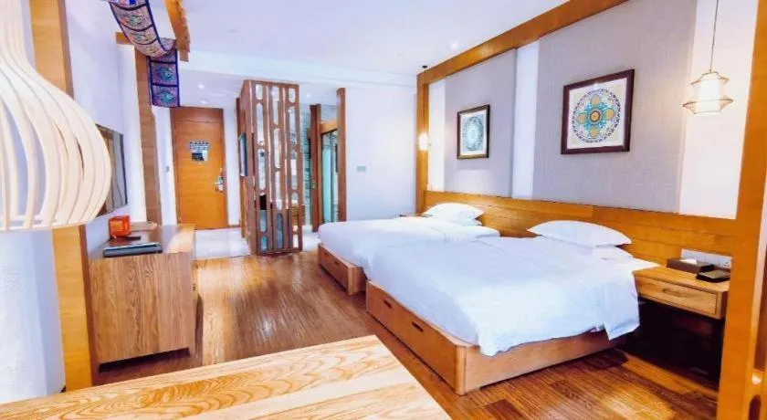 Bed in Ramada by Wyndham Guergou